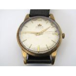 1950s Marvin Revue automatic 9ct gold gentleman's wrist watch, the champagne dial with gilt baton