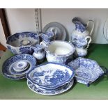 A collection of mainly 19th century blue and white printed ceramics including three graduated jugs