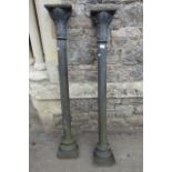 A pair of heavy cast iron architectural columns with acanthus caps, 130 cm high approx