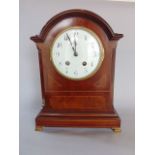 Early 20th century mahogany lancet bracket type clock, the two train 13cm dial with Arabic numerals,