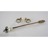 A yellow metal pearl and diamond set stick pin together with a pair of 9ct faceted aquamarine stud