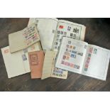 Three stamp albums and three stockbooks containing a quantity of early 20th century British and