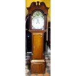 A Regency mahogany longcase clock, the trunk with reeded and canted corners, the full length door