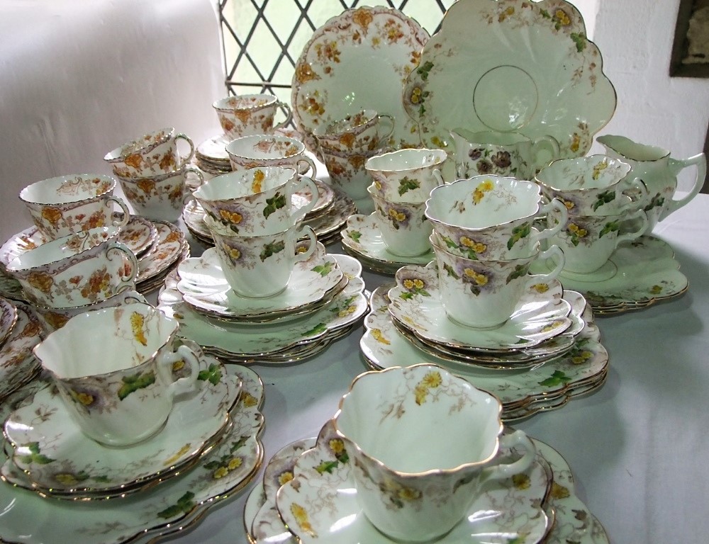 A collection of late 19th century teawares of wrythen moulded form comprising a pair of cake plates, - Image 2 of 2