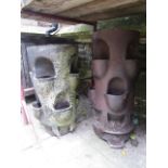Two reclaimed salt glazed chimney pots with open moulded vents, later used as garden planters