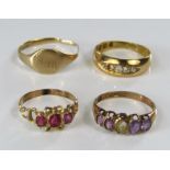 Four gold rings to include a ruby, an amethyst and an 18ct diamond example, 7.5g total (af)