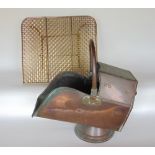 An antique faceted copper coal scuttle together with a further mesh fire guard (2)