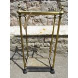 A late Victorian brass six divisional umbrella/stick stand with simple turned columns and