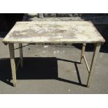 A simple painted pine folding trestle table with square tapered legs, 106 cm x 60 cm approx