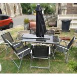 A contemporary coated light aluminium framed garden table of rectangular form with rounded corners