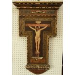 An unusual 19th century carved wooden plaque with painted and gilded plaster work finish, with