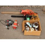 A Flymo Easicut 600XT electric hedge trimmer, A Florabest electric chain saw FKS2200 C2, a 500w
