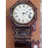 A 19th century rosewood and mother of pearl inlaid single fusee drop dial wall clock, the