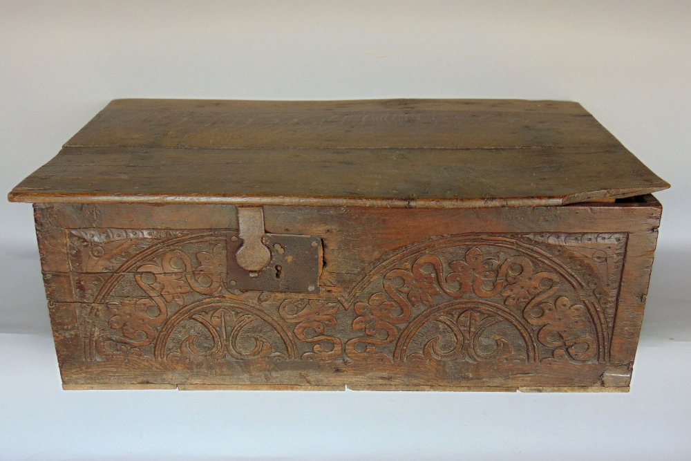 Antique oak lidded box, the front with carved arcaded panels, 72cm long