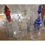 A good quality blue cut glass lidded decanter with star and hob nail decoration, together with a