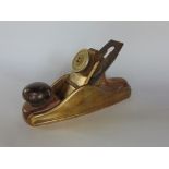 A good quality 19th century wood working plane with heavy bronze frame