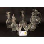 Two boxes of glassware to include a collection of decanters and various wine glasses, goblets and