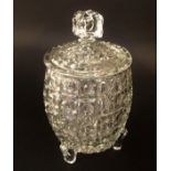 An early American pressed glass biscuit barrel with geometric relief decoration, 24 cm high