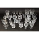 A collection of various glasses to include tumblers, sherry glasses and others