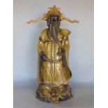 Cast bronze and gilt bronze study of a standing sage, 36cm high