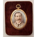 An early 20th century school - bust portrait of a stylish gentleman, miniature work on ivory, within