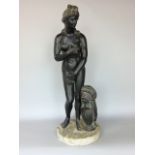 A cast bronze study of a standing nude female upon a marble plinth base, 60cm high; together with