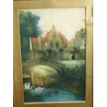 An early 20th century continental limited edition signed coloured etching of a town scene with canal