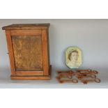 Antique wooden smokers cabinet together with a tin containing a collection of antique keys