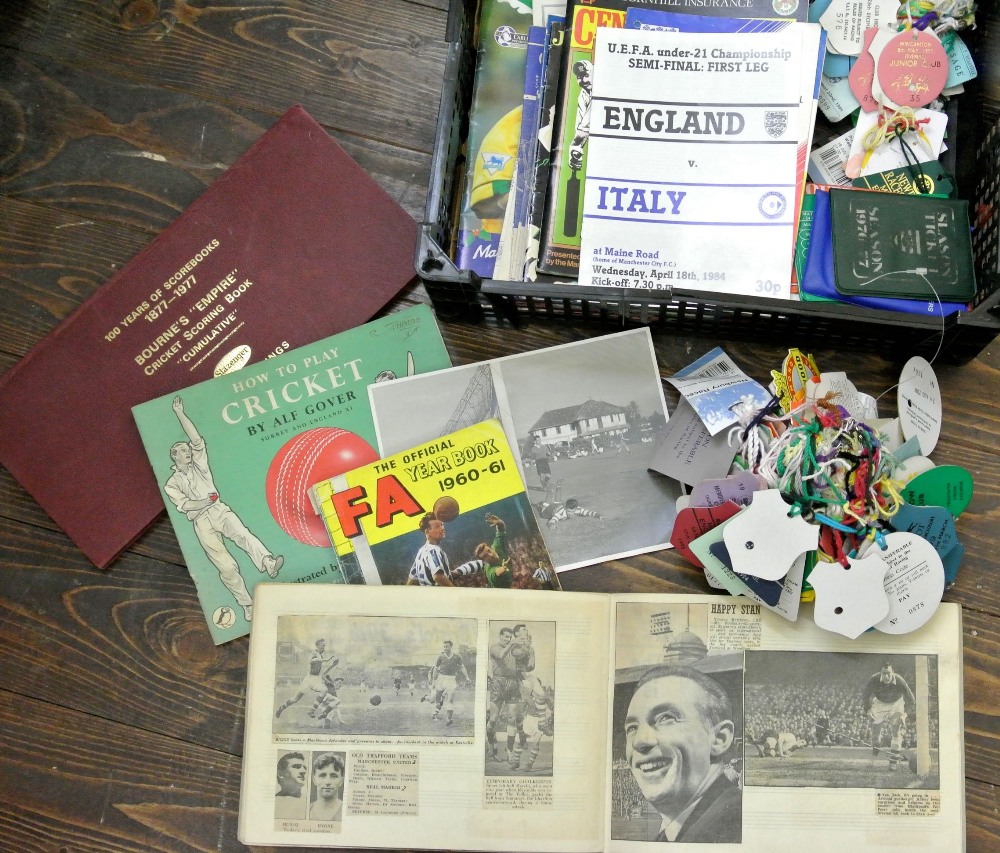 A box containing a collection of sport ephemera including FA Year Book 1960/61, QPR season