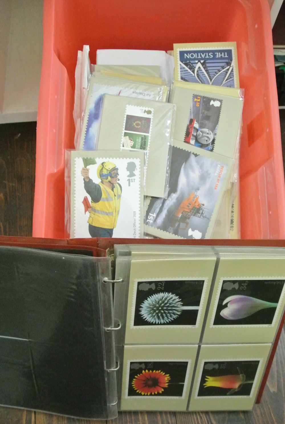 A box containing a very large quantity of PHQ cards