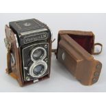 A Yashicalm vintage camera in leather case