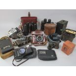 Mixed collection of vintage cameras and binoculars