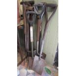 A small collection of vintage and contemporary long handled gardening tools (spades and forks)