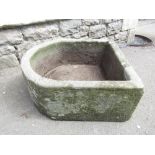 A good quality D end local stone trough, 55cm max