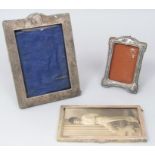 Three silver applied picture frames