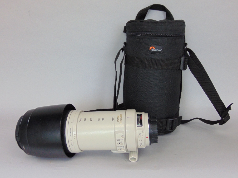 A Canon 100-400 mm lens, with carry case