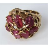 A vintage 14k ring set with carved rubies in naturalistic mount, size K, 11.3g