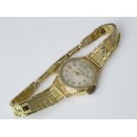 Vintage ladies Wengia wrist watch with fancy champagne dial, Arabic numerals upon a fancy 14ct