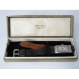 A 1920/30s gent's wrist watch, the rectangular chrome dial with Arabic numerals within a Mappin &