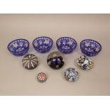 A set of four cut blue glass finger bowls with grapevine decoration together with five