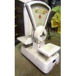 Set of vintage shop scales by Swift to weigh one pound, with white enamel finish