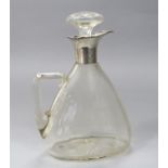 An attractive glass and silver collared claret jug, with wavy rim, Chester, with stopper, 25cm high