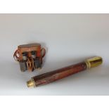 Interesting antique leather clad and brass draw telescope, together with a further cased set of