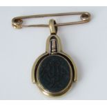 An 18ct swivel watch key fob set with bloodstone monogram and reverse with carnelian intaglio,