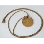 A half sovereign dated 1910, loose mounted in a 9ct necklace, 8.4g total