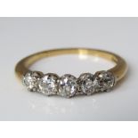 An 18ct five stone diamond ring, size N, 3g