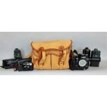 M Billingham & Co camera carry case containing a Nikon F4 camera, various flashes and others