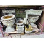 Nine various weathered reconstituted garden ornaments in the form of urns, troughs and bird bath,