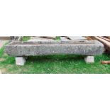 A good weathered local stone feeding trough, 2m 30cm long