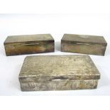 Three silver cedar lined cigar/cigarette boxes, the largest 18cm long (3)